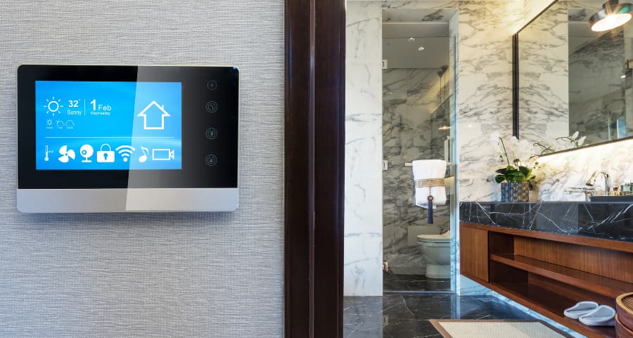 Smart home central touchscreen on wall near bathroom